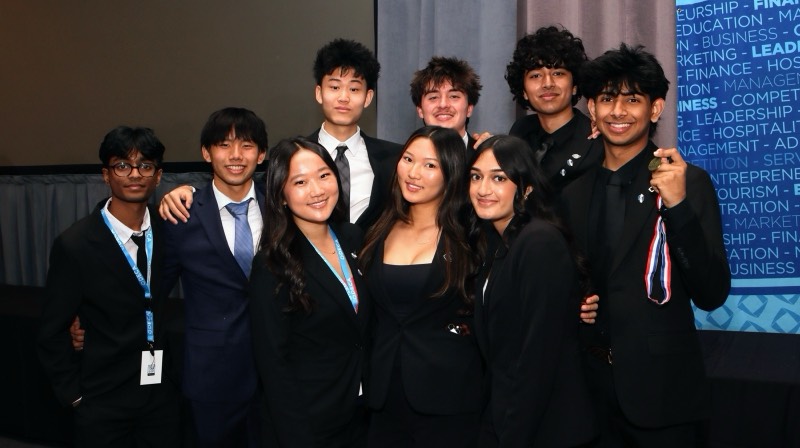 A group of Amador Valley DECA members at a conference